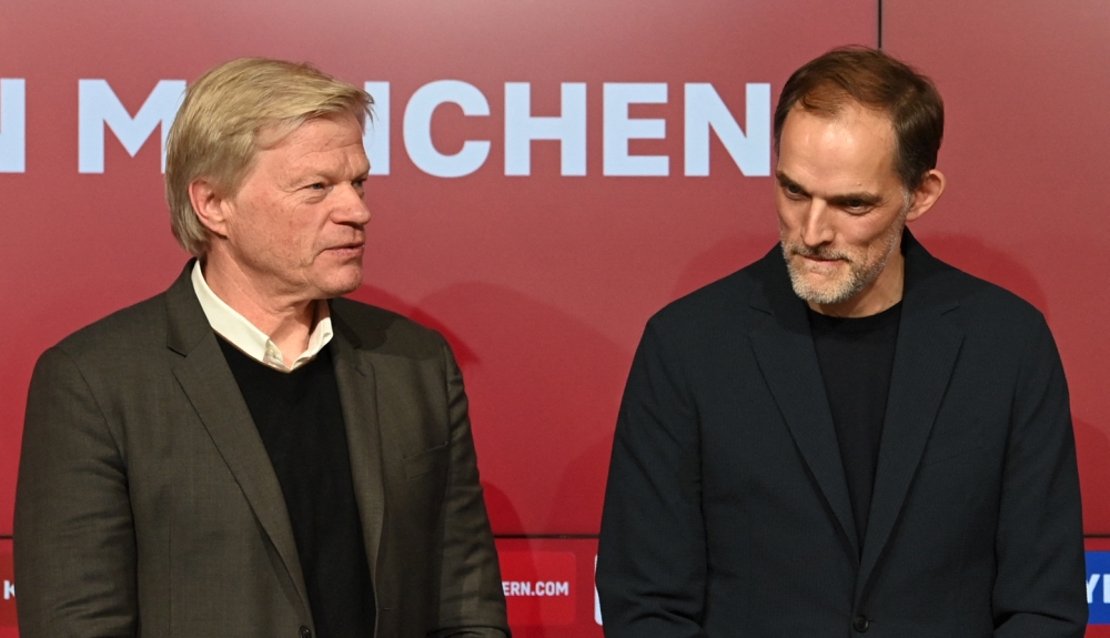 Bayern Munich's CEO Oliver Kahn (left) and Bayern Munich's new head coach Thomas Tuchel pose for medias after a press conference in Munich, southern Germany, on March 25, 2023. - Bayern Munich announced on March 24, they had appointed former Chelsea and Paris Saint-Germain coach Thomas Tuchel as their new boss after firing Julian Nagelsmann. (Photo by Christof STACHE / AFP)
