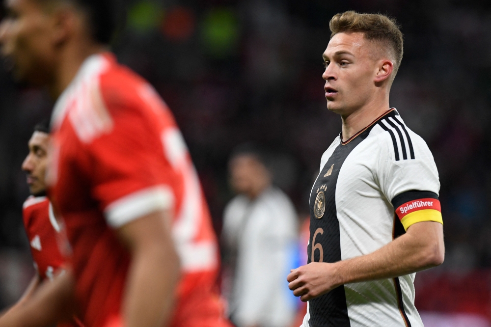 Germany's midfielder Joshua Kimmich wears the captain's armband during the international friendly football match Germany v Peru in Mainz, southern Germany, on March 25, 2023. (Photo by Thomas Kienzle / AFP)
 