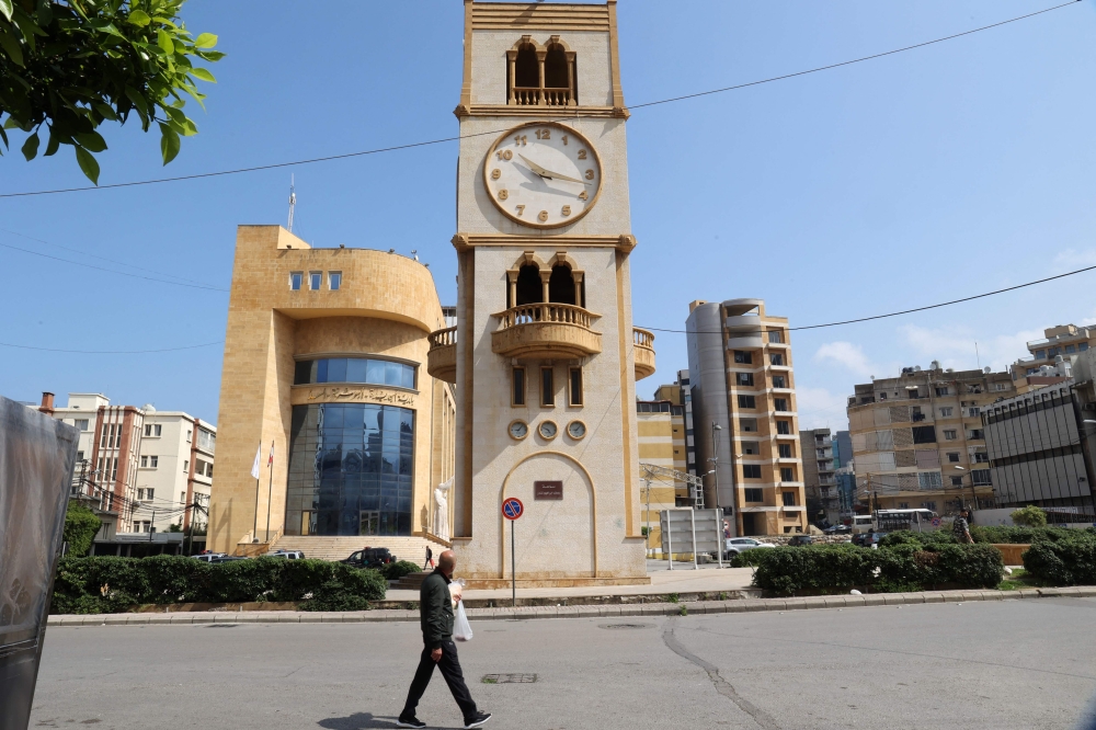 A clock tower in Beirut's Jdeideh district indicates the time on March 26, 2023, after Lebanon's government announced a decision to delay daylight savings. (Photo by Anwar Amro / AFP)
