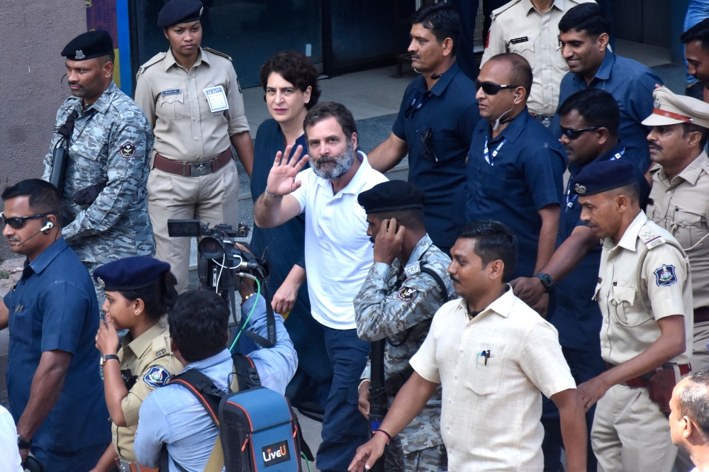 India's Congress party leader Rahul Gandhi (centre) arrives at a court in Surat on April 3, 2023. (Photo by AFP)