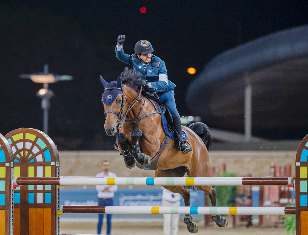 Qatari rider Faleh Suwead Al Ajami astride Crispo celebrates after winning the final round. INSET: Al Ajami receives trophy from QEFMP President Bader Al Darwish.   