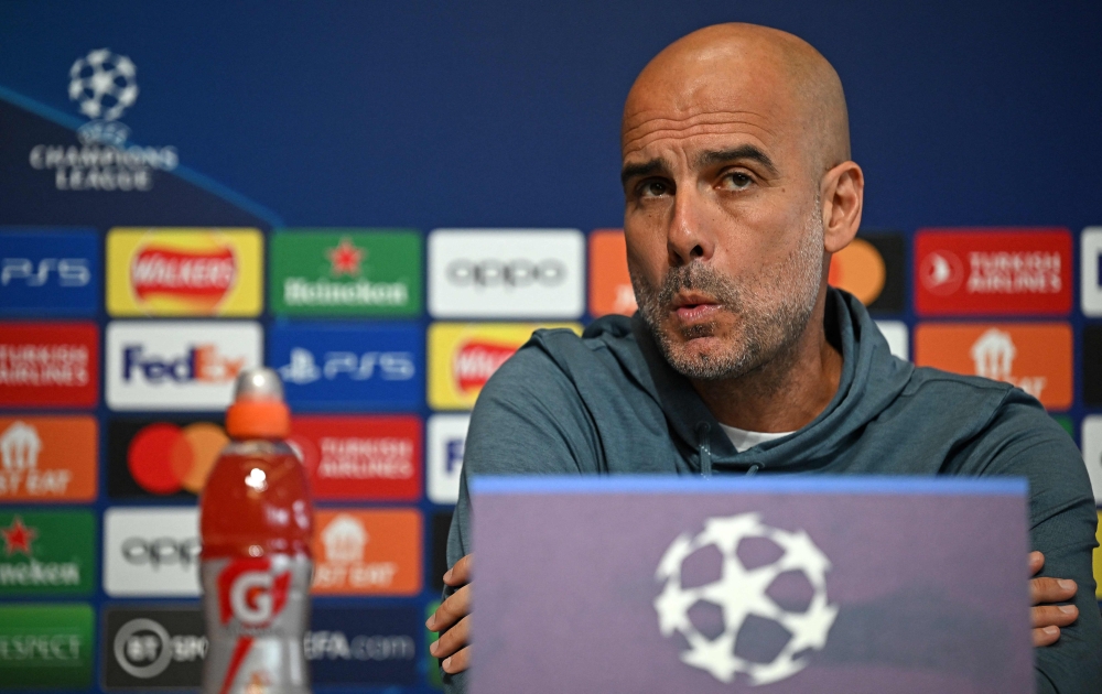 Manchester City's Spanish manager Pep Guardiola attends a press conference at Manchester City training ground in Manchester, north-west England on April 10, 2023, on the eve of their UEFA Champions League quarter-final first leg football match against Bayern Munich. Photo by Paul ELLIS / AFP