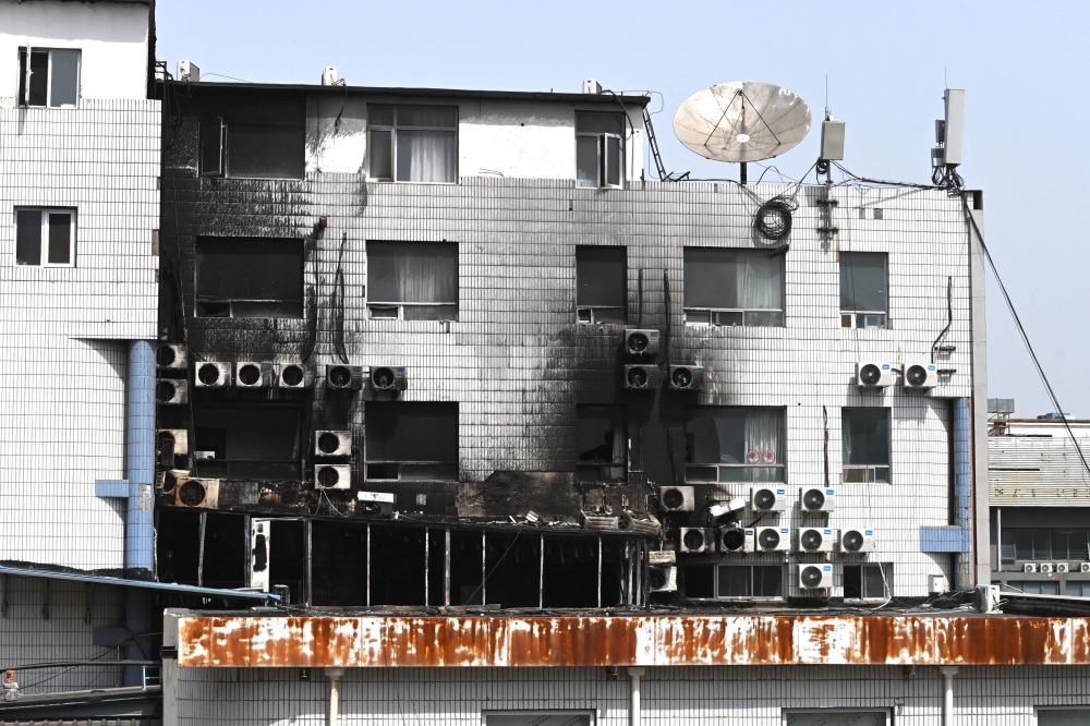 Fire damage is seen at the Changfeng Hospital in Beijing on April 19, 2023, after a fire broke out a day earlier. Photo by GREG BAKER / AFP