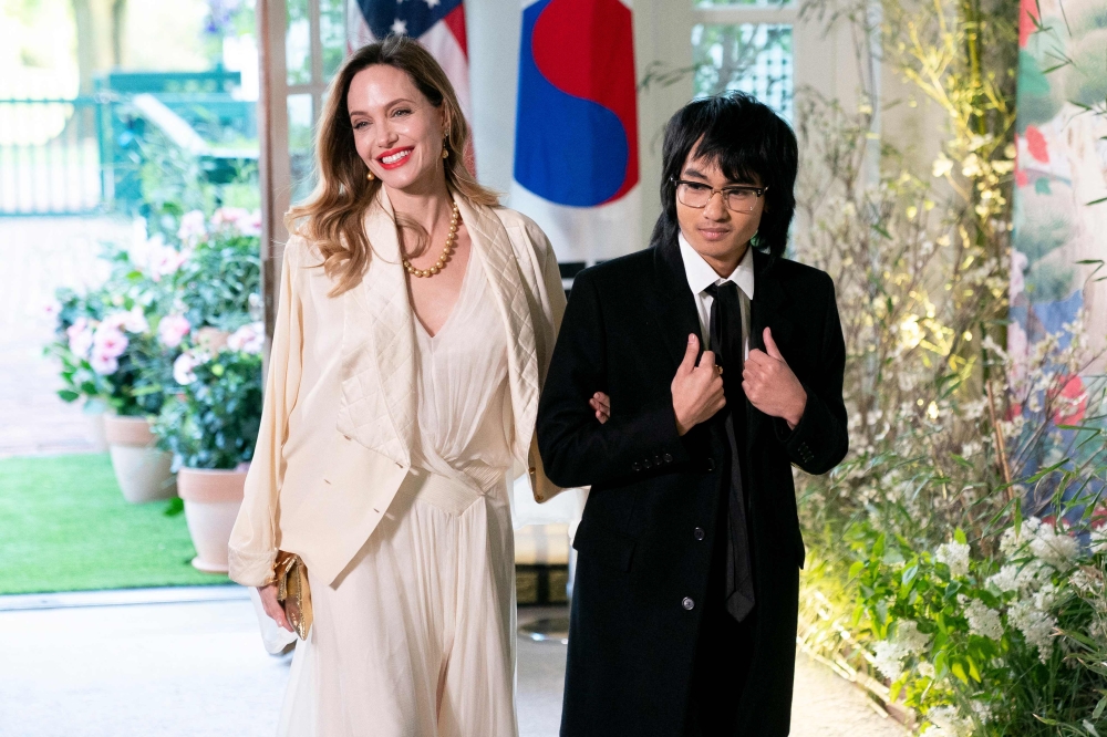 US actress Angelina Jolie and son Maddox arrive for the State Dinner in honor of South Korean President Yoon Suk Yeol, at the White House in Washington, DC, on April 26, 2023. Photo by Stefani Reynolds / AFP