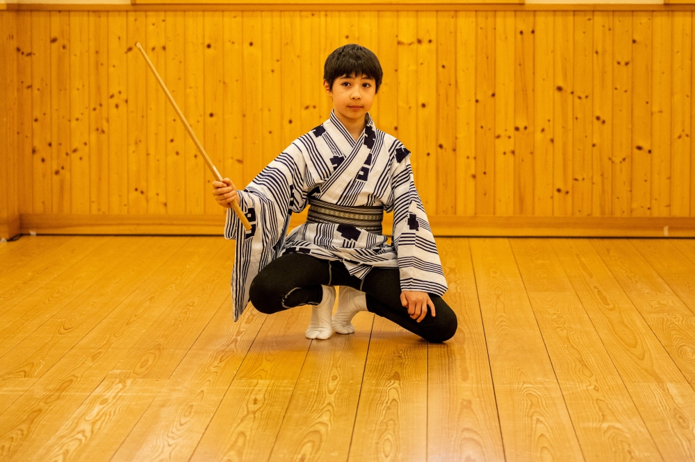 This picture taken on April 5, 2023 shows 10-year-old French-Japanese kabuki actor Maholo Terajima in a rehearsal room at the Kabuki-za theatre in Tokyo. (Photo by Philip Fong / AFP)