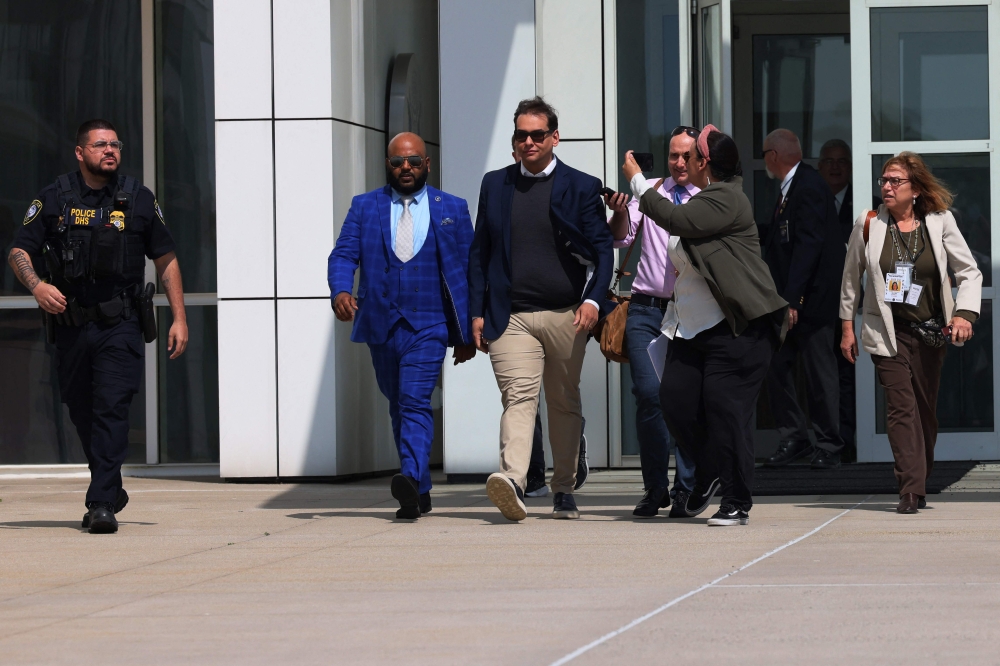Rep. George Santos (R-NY) leaves Federal Court on May 10, 2023 in Central Islip, New York. Federal prosecutors in the Eastern District of New York have charged Santos in a 13-count indictment that includes seven counts of wire fraud, three counts of money laundering, one count of theft of public funds, and two counts of making materially false statements to the House of Representatives. (Photo by Michael M. Santiago / GETTY IMAGES NORTH AMERICA / Getty Images via AFP)
