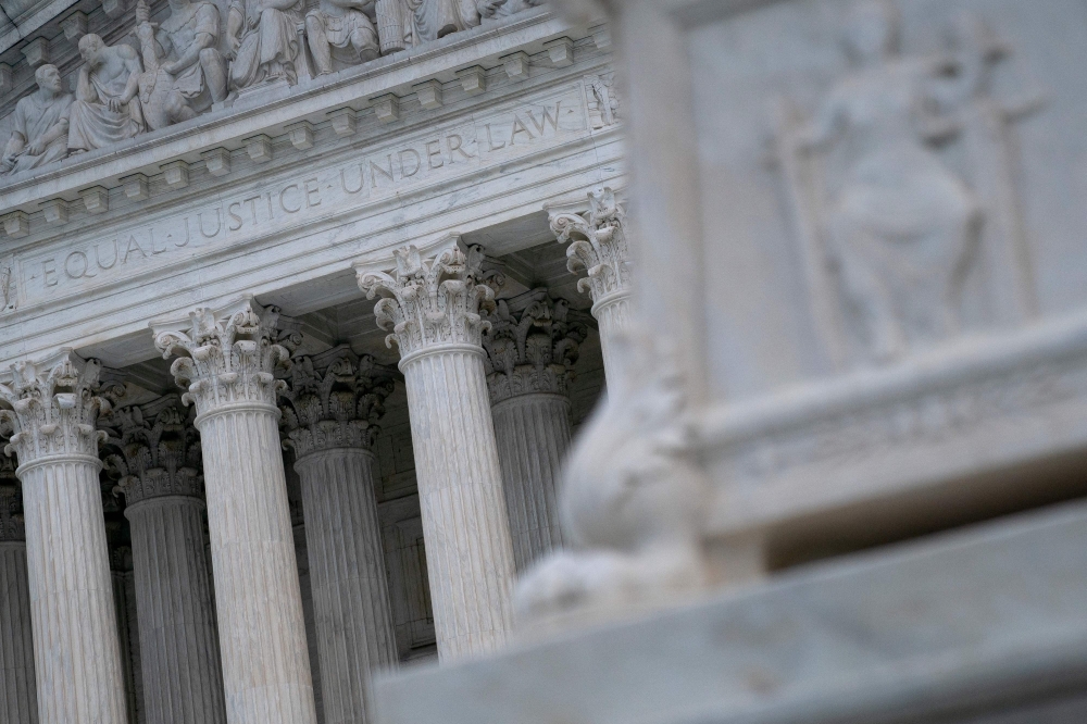 File photo: The US Supreme Court building stands in Washington, DC, on October 3, 2022. (Photo by Stefani Reynolds / AFP)
