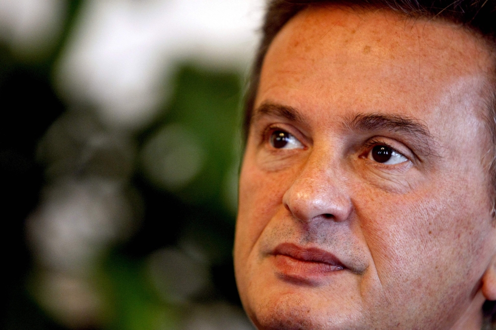 This file picture dated November 21, 2008 shows Lebanon's Central Bank governor Riad Salameh listening to a question during an interview with AFP at his office in Beirut. (Photo by Ramzi Haidar / AFP)