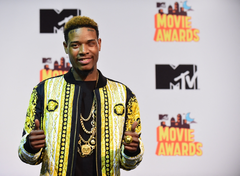 US rapper Fetty Wap poses in the press room during the 2015 MTV Movie Awards in Los Angeles, California, on April 12, 2015. (Photo by Frederic J. BROWN / AFP)

