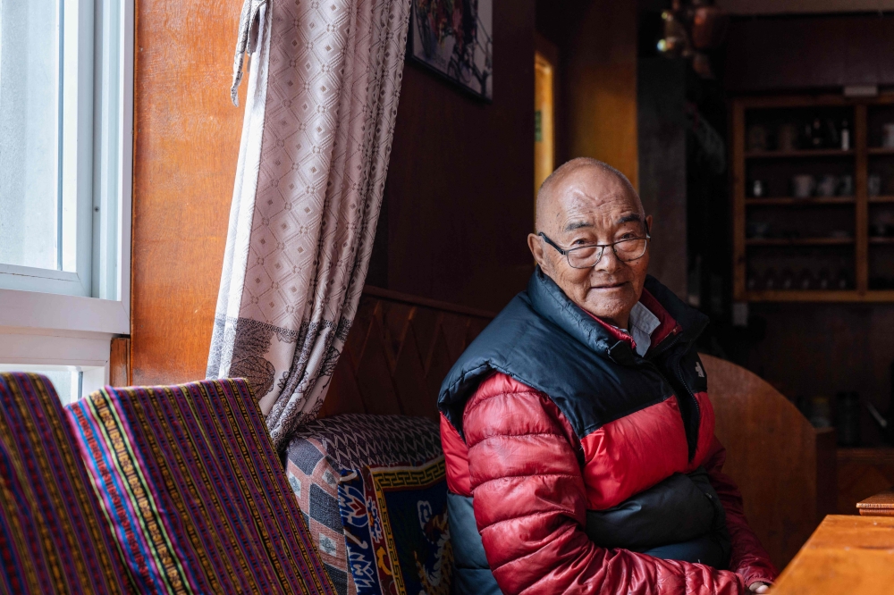 In this picture taken on May 28, 2023, Kancha Sherpa looks on during an interview on the eve of International Everest Day, at Namche Bazar in Solukhumbu district, northeast of Kathmandu.  (Photo by Robic Upadhayay / AFP) 