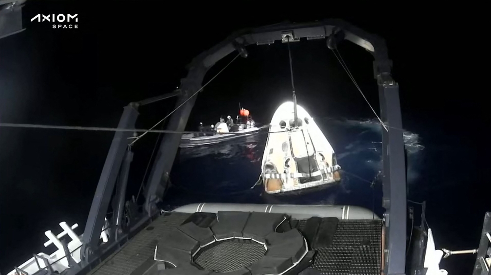 This still image taken from an Axiom Space video shows a SpaceX capsule being retrieved after splashdown off the coast of Florida on May 31, 2023. (Photo by Jose Romero / AXIOM SPACE / AFP)