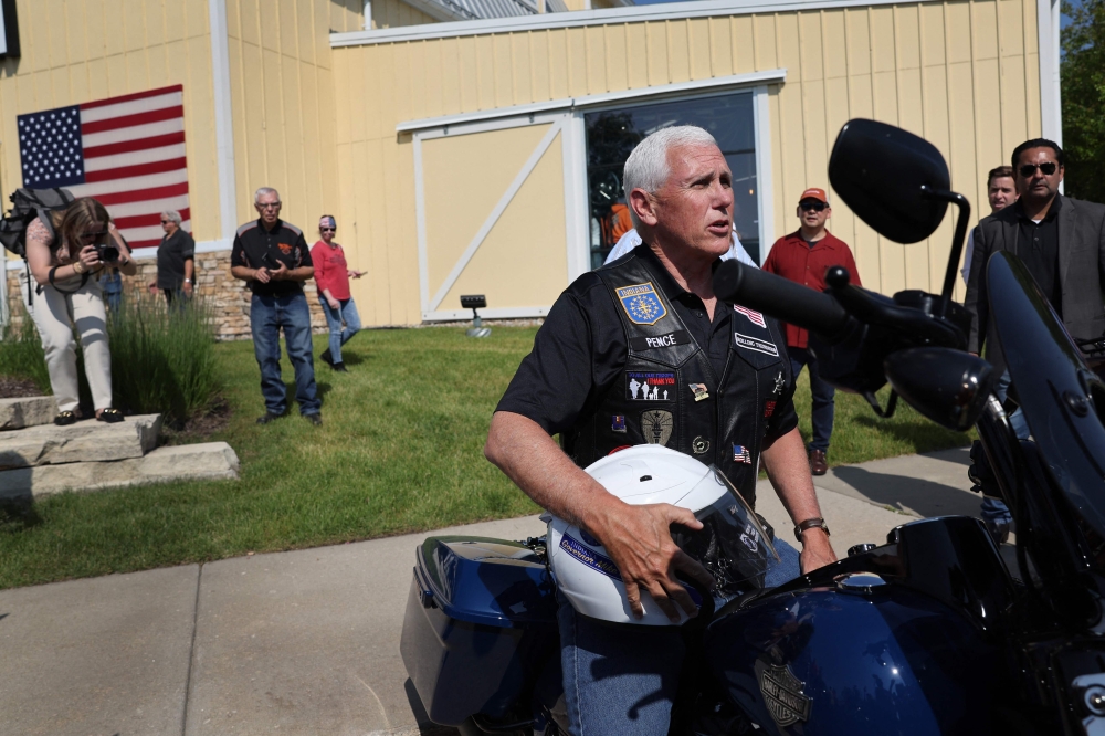 Former Vice President Mike Pence prepares for the start of Joni Ernst's Roast and Ride on June 03, 2023 in Des Moines, Iowa. (Photo by Scott Olson / Getty Images via AFP)