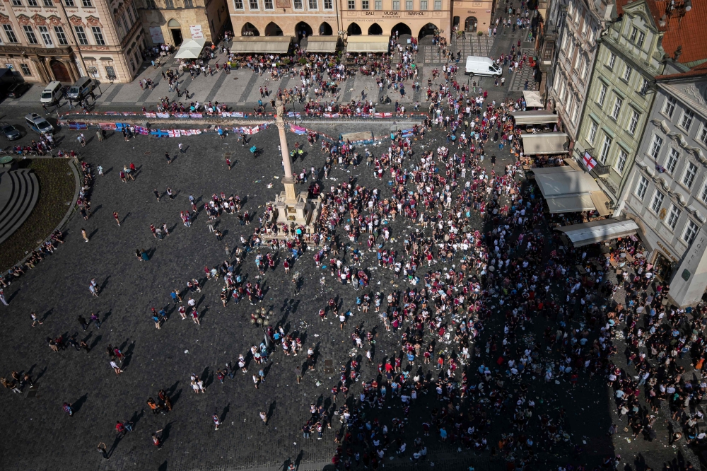 Supporters of West Ham United gather to cheer for their team at the Old Town Square ahead of the UEFA Europa Conference League 2022/23 final match between ACF Fiorentina and West Ham United FC in Prague, Czech Republic on June 7, 2023. (Photo by AFP)