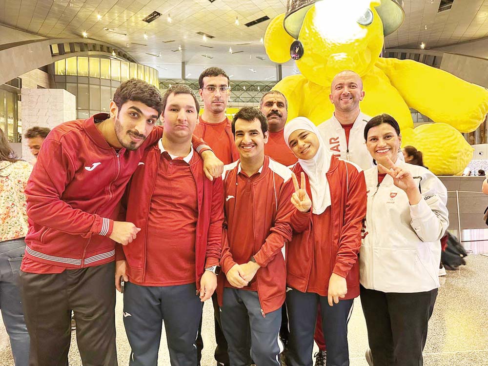 Qatar Special Olympics team athletes and officials pose for a photo prior to their departure.