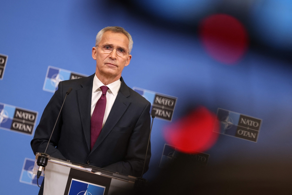 NATO Secretary General Jens Stoltenberg addresses a press conference during a two-day meeting of the North Atlantic Council (NAC) with Defence Ministers, at the NATO headquarters in Brussels on June 16, 2023. (Photo by SIMON WOHLFAHRT / AFP)