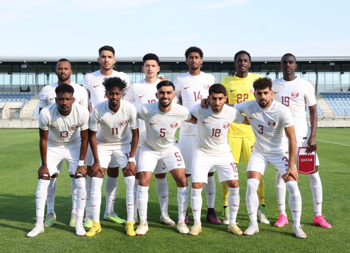 Qatar players pose for a group photo before friendly against New Zealand.