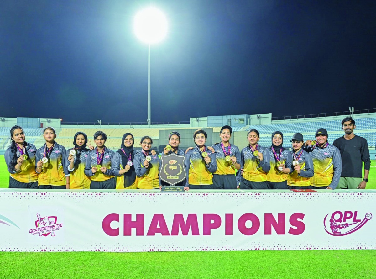 Al Bidda Knights players and officials pose for a photograph after winning the final.