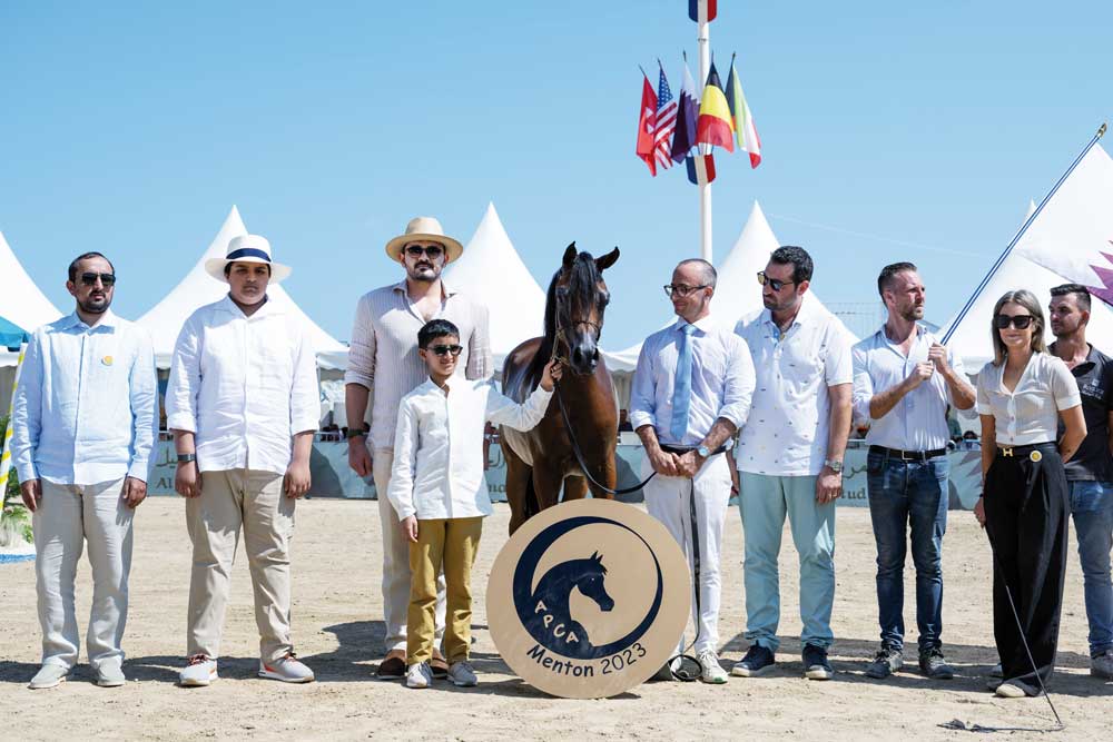 QOC President and Chairman of Al Shaqab H E Sheikh Joaan bin Hamad Al Thani along with other officials poses with Al Shaqab’s medal winning horse.  