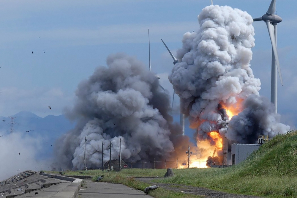 This handout picture taken on July 14, 2023 by photographer Minoru Otsuka and received via Jiji Press shows a Japanese rocket engine exploding during a combustion test at the Noshiro Testing Center in Noshiro, Akita Prefecture. Photo by Minoru Otsuka / JIJI PRESS / AFP
