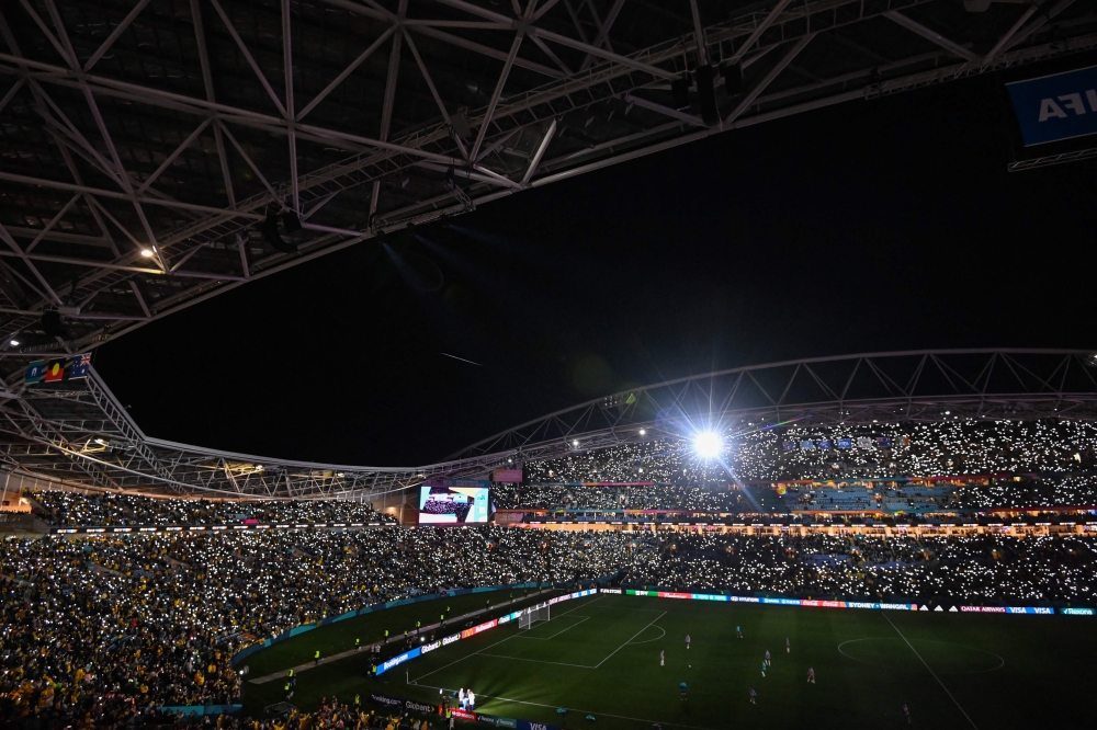 A general view showing the pitch and the stands during the halftime of the Australia and New Zealand 2023 Women's World Cup Group B football match between Australia and Ireland at Stadium Australia, also known as Olympic Stadium, in Sydney on July 20, 2023. (Photo by Izhar KHAN / AFP)