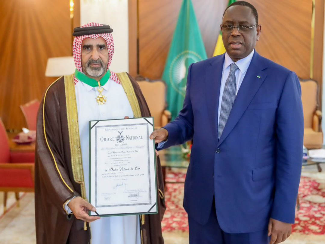 President of the Republic of Senegal H E Macky Sall with the Ambassador of the State of Qatar to Senegal H E Mohammed bin Kurdi Taleb Al Marri during the award presentation.
