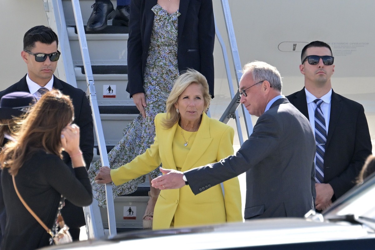 US First Lady Jill Biden (C) is welcomed as she arrives to celebrate the US rejoining UNESCO, at the Orly Airport in Orly, Paris' suburb, on July 24, 2023. (Photo by Alain JOCARD / AFP)