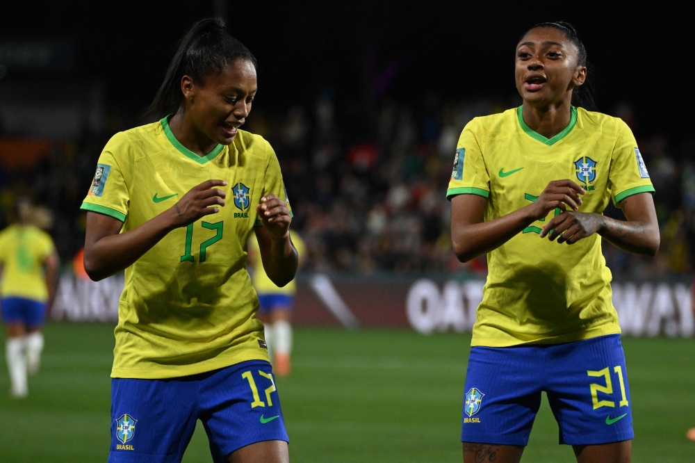 Brazil's midfielder #17 Ariadina Borges (L) celebrates with Brazil's midfielder #21 Kerolin (R) after scoring a goal during the Australia and New Zealand 2023 Women's World Cup Group F football match between Brazil and Panama at Hindmarsh Stadium in Adelaide on July 24, 2023. (Photo by Brenton Edwards/ AFP)