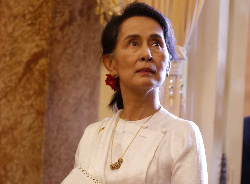 Myanmar State Counsellor Aung San Suu Kyi arrives for a meeting at the Presidential Palace in Hanoi on September 13, 2018. (Photo by Kham / Pool / AFP)