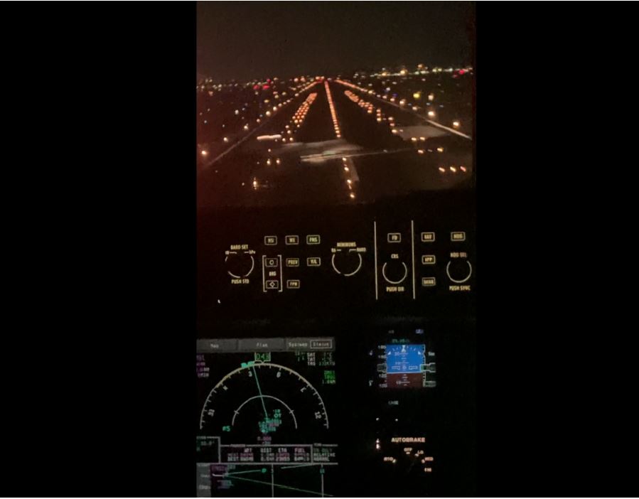 Screen capture from jump-seat occupant’s video recording showing Lear 60 crossing runway centerline.