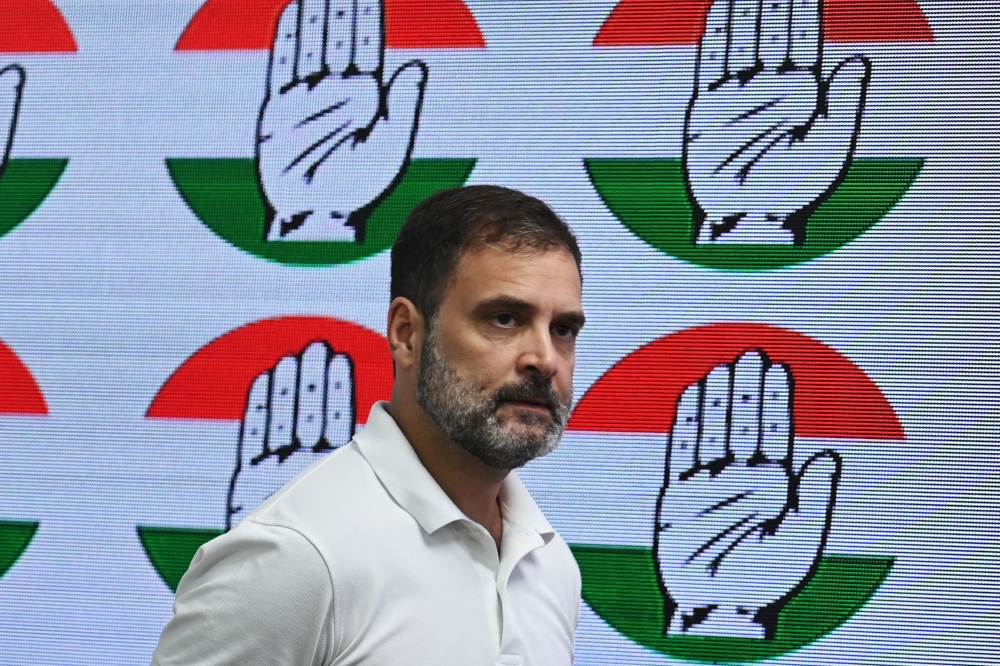 (Files) In this file photo taken on August 4, 2023, India's Congress party leader Rahul Gandhi arrives for a media briefing at the party headquarters in New Delhi (Photo by Arun Sankar / AFP)
 