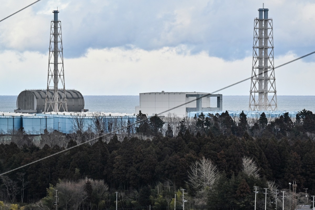 This photo taken on February 14, 2023 shows the Fukushima Daiichi nuclear power plant during a government-sponsored tour in Okuma, ahead of the 12th anniversary of the March 11, 2011 earthquake and tsunami which hit the area and crippled the plant. Photo by Richard A. Brooks / AFP