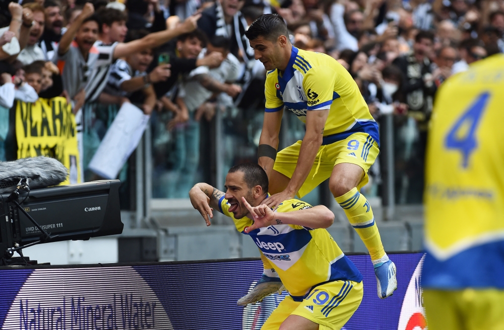 File photo: Juventus' Leonardo Bonucci celebrates scoring their first goal with Alvaro Morata. REUTERS/Massimo Pinca.

