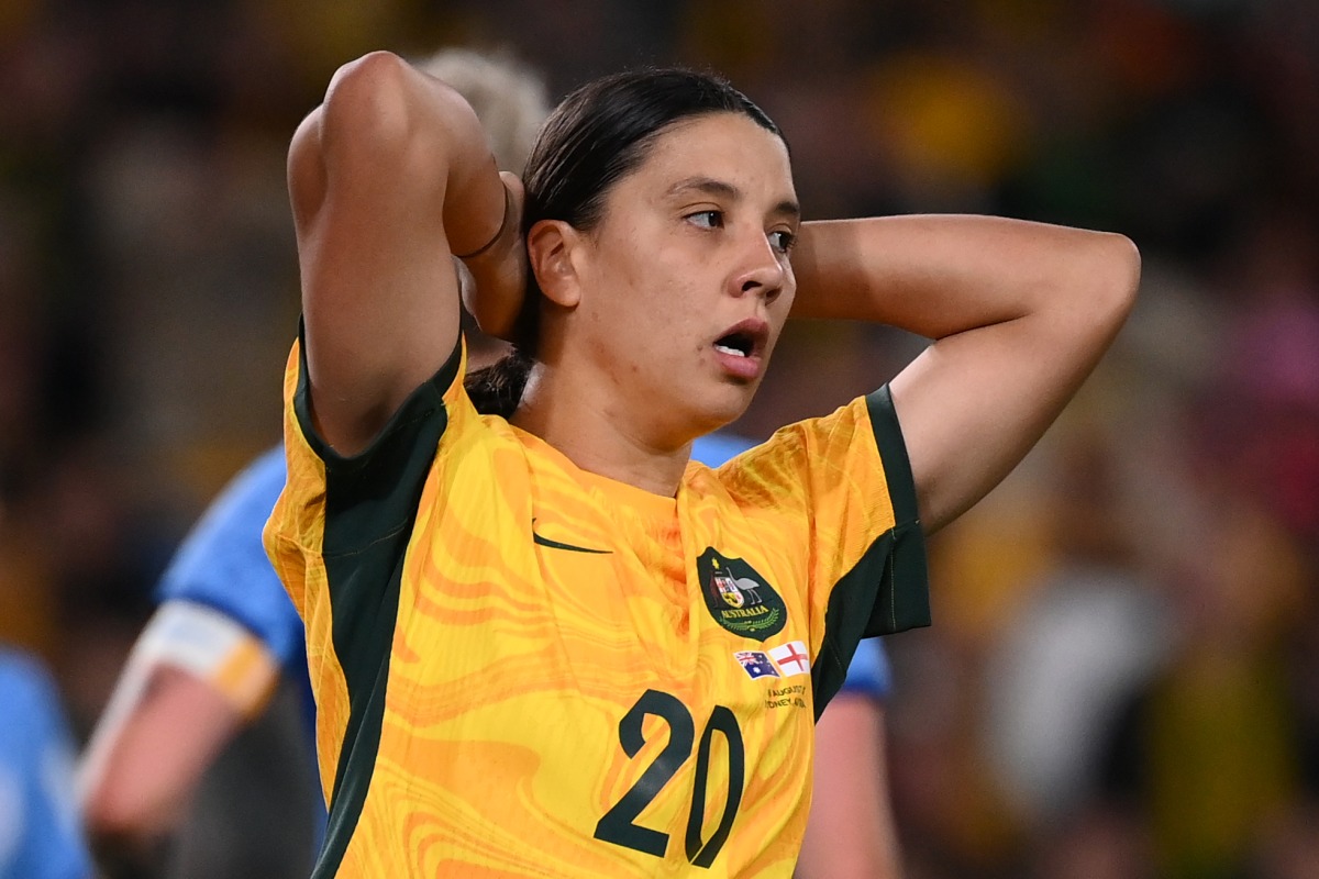 Australia's forward #20 Sam Kerr reacts to a missed chance during semi-final football match between Australia and England at Stadium Australia in Sydney on August 16, 2023. (Photo by Franck Fife / AFP)