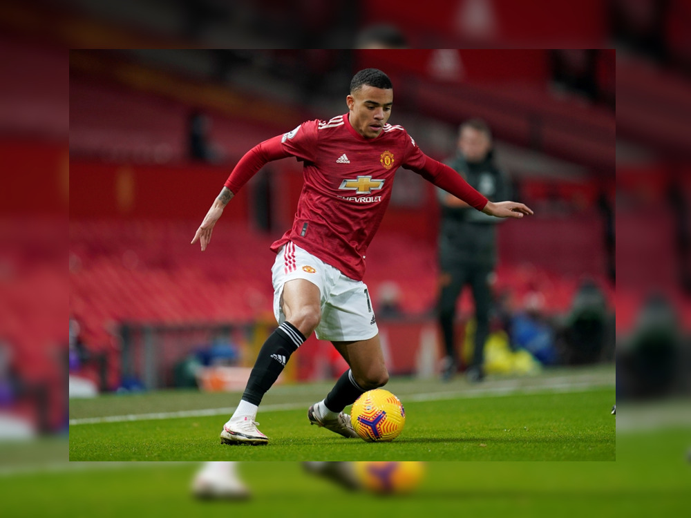 File photo: Manchester United's Mason Greenwood in action Pool via REUTERS/Tim Keeton

