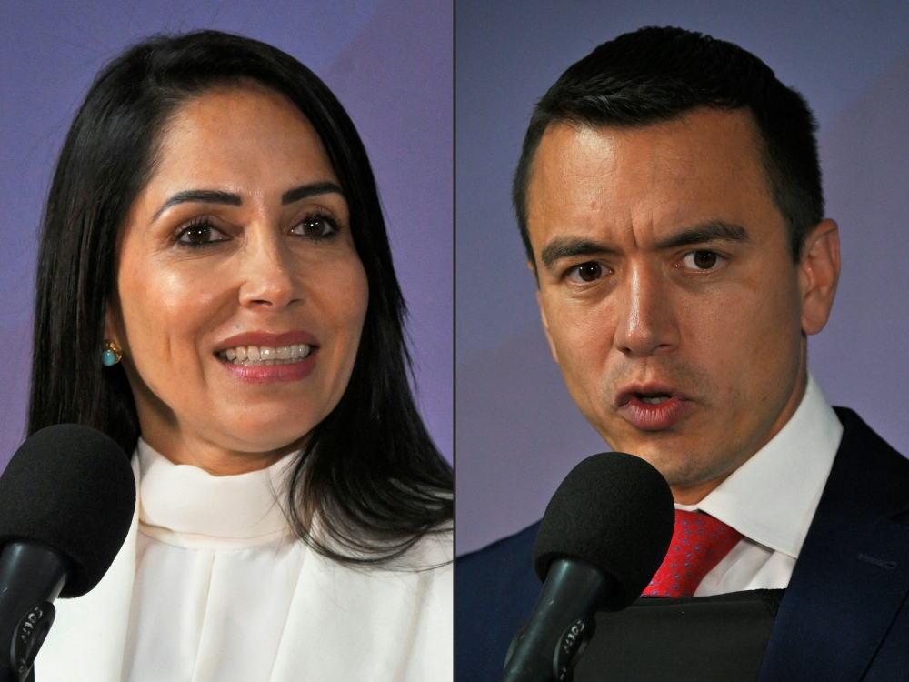 This combination of pictures created on August 21, 2023 shows Ecuadorian presidential candidates Luisa Gonzalez (L) for the Movimiento Revolucion Ciudadana party and Daniel Noboa, for the National Democratic Action party, during a presidential debate in Quito, on August 13, 2023. (Photo by Rodrigo BUENDIA / AFP)
