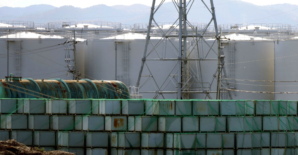 This photo taken on November 7, 2022 shows treated water tanks lined up on the site of Tokyo Electric Power Company (TEPCO)'s Fukushima Daiichi nuclear power plant in Okuma, Fukushima prefecture. Photo by JIJI Press / AFP