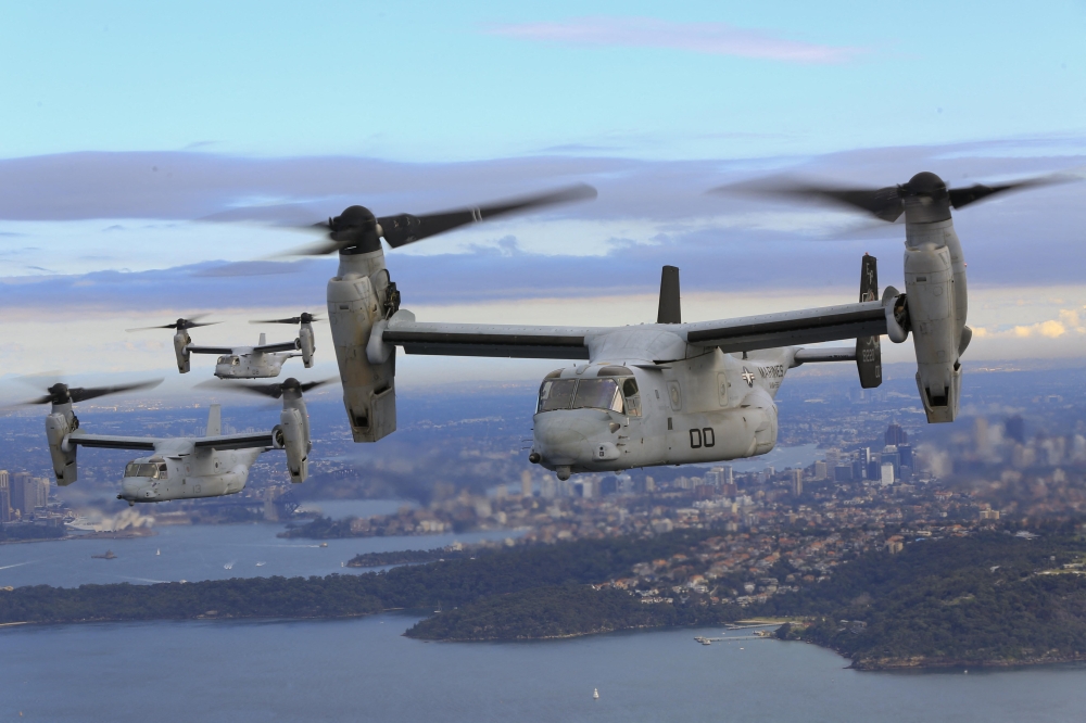 This image obtained from the US Marine Corps shows three MV-22B Osprey tiltrotor aircrafts flying in formation above the Pacific Ocean off the coast of Sydney on June 29, 2017. Photo by Amy PHAN / US MARINE CORPS / AFP