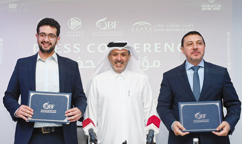 FROM LEFT: Founder, Beyond Sports/Beyond Perspective Ahmed Kazwini, Qatar Basketball Federation Secretary-General Saadoun Sabah Al Kuwari and Elite Motors General Manager Mohammad Subaei pose for a photograph.