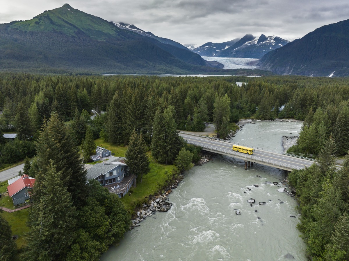 A bus crosses over the Mendenhall River on Aug. 8 in Juneau. Mendenhall Glacier is seen on the horizon. All photos for The Washington Post by Christopher S. Miller