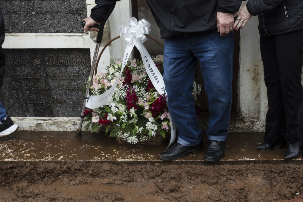 Relative attend the funeral of a victim of a cyclone that hit Roca Sales, Rio Grande do Sul, Brazil, during his funeral in the city's cemetery, on September 9, 2023. Photo by SILVIO AVILA / AFP