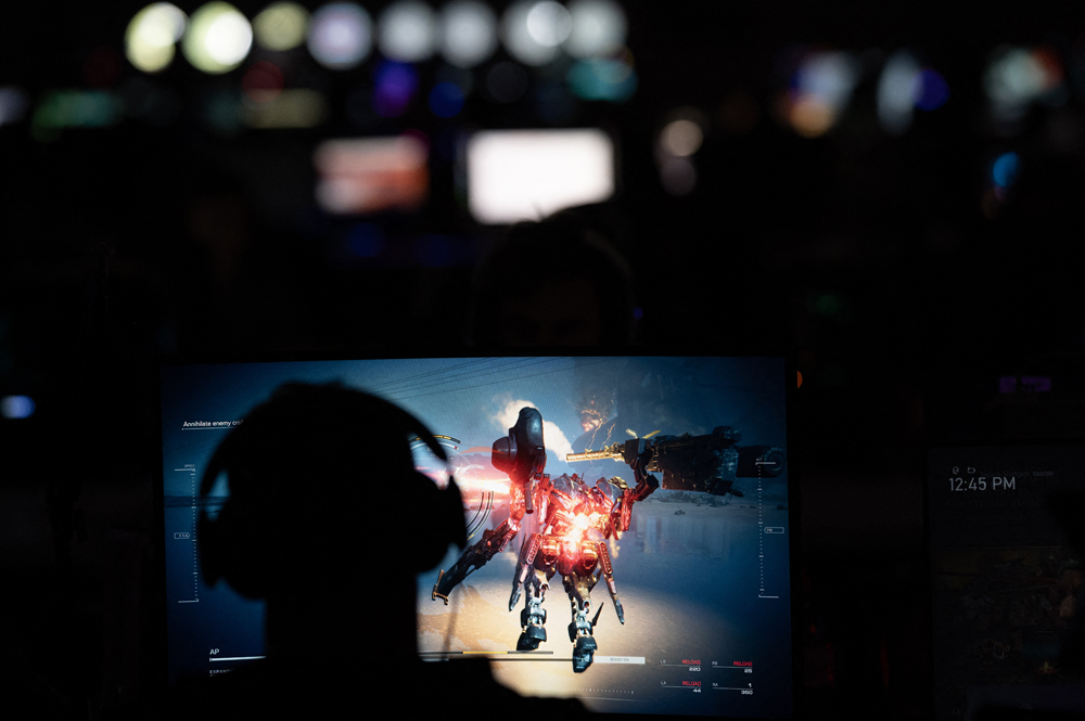 Members of the gaming community compete during the four-day Insomnia Gaming Festival at the NEC in Birmingham, central England, on September 9, 2023. Photo by Oli SCARFF / AFP