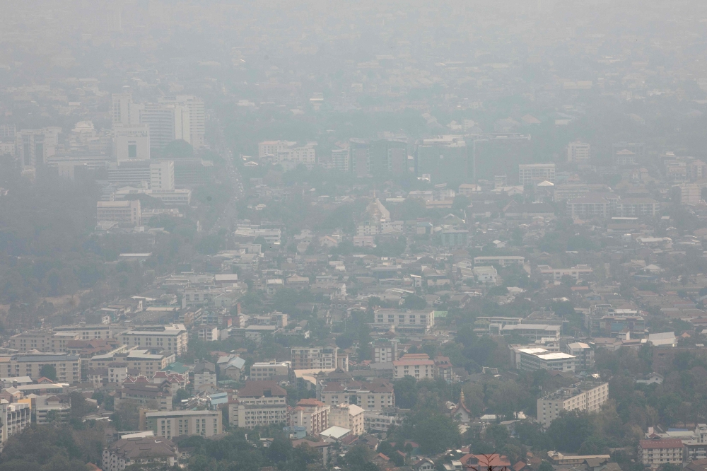 (Files) A general view shows hazy conditions due to air pollution in Chiang Mai in northern Thailand on March 10, 2023. (Photo by AFP)