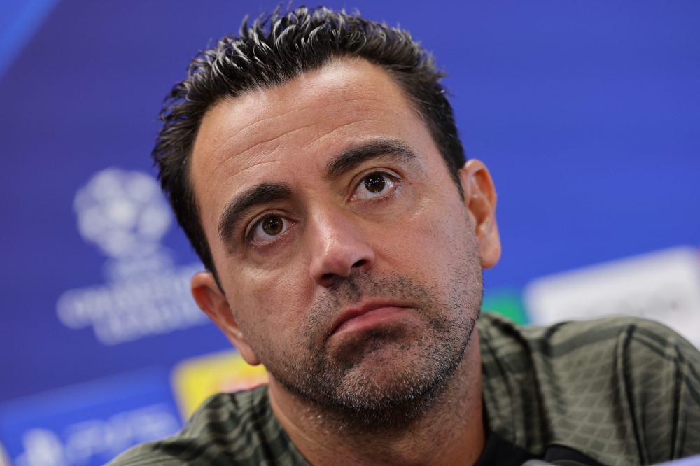 Barcelona's Spanish coach Xavi gives a press conference on the eve of the UEFA Champions League football match between FC Barcelona and Royal Antwerp FC on September 18, 2023. (Photo by LLUIS GENE / AFP)