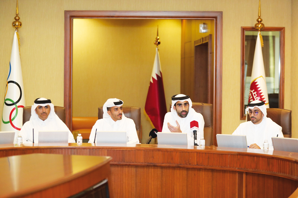 Chairman of the Organizing Committee of the Olympic Program Sheikh Khalifa bin Khalid Al Thani along with other officials during the press conference.