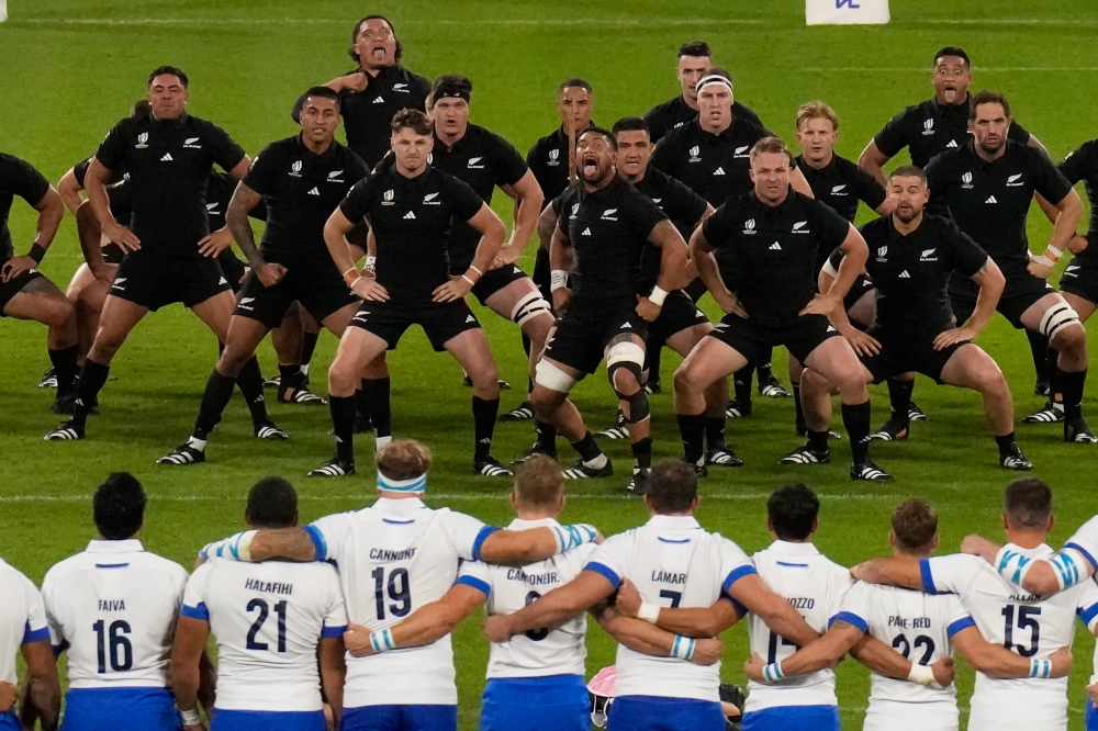 The All Blacks perform the Haka during the France 2023 Rugby World Cup Pool A match between New Zealand and Italy at the OL Stadium in Decines-Charpieu, near Lyon, south-eastern France, on September 29, 2023. (Photo by Francis BOMPARD / AFP)