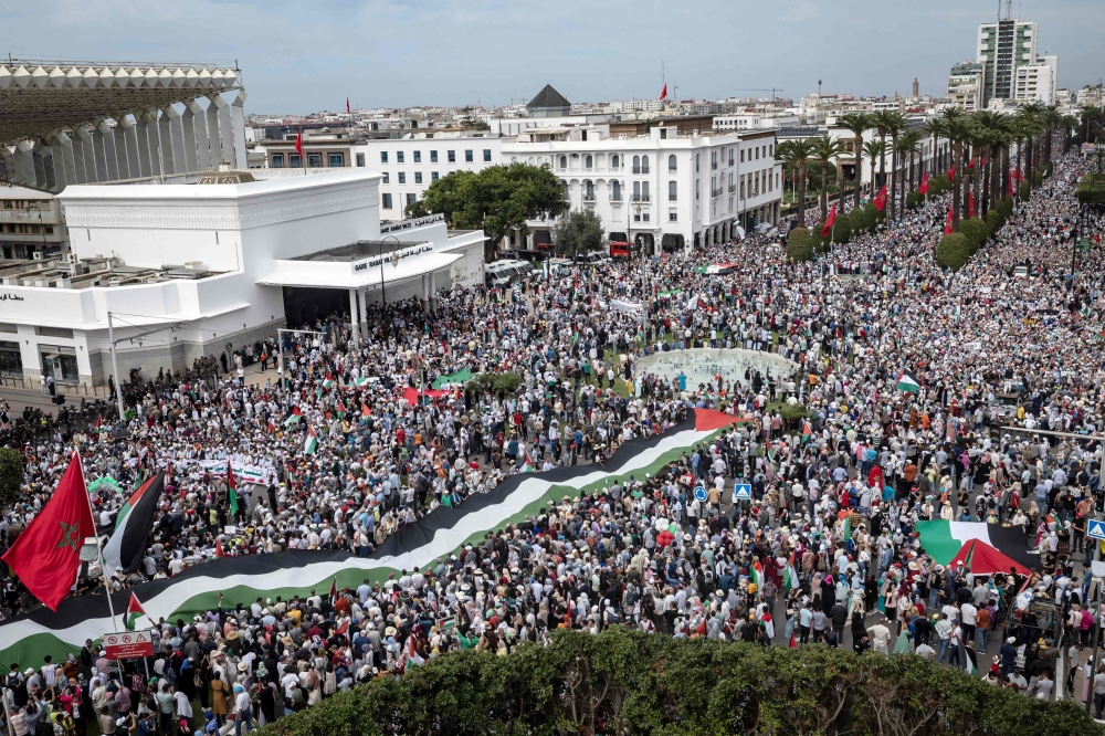 Demonstrators march in Rabat to express support to Palestinians in October 15, 2023. (Photo by Fadel Senna / AFP)