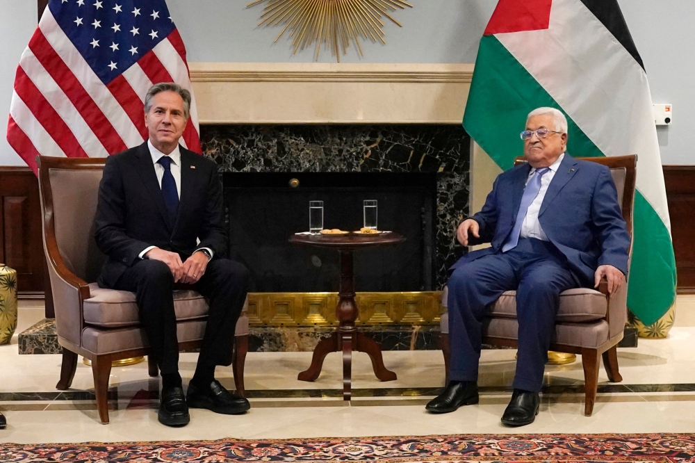 US Secretary of State Antony Blinken (left) meets with Palestinian President Mahmoud Abbas, in Amman, Jordan on October 17, 2023. (Photo by Jacquelyn Martin / POOL / AFP)