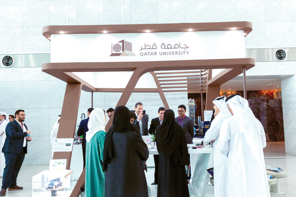 Participants visiting QU booth at the 18th Engineering Forum of QatarEnergy LNG.