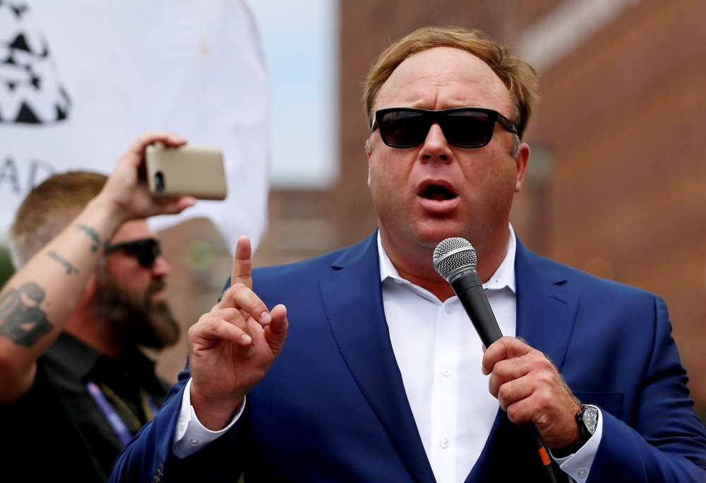 File photo: Alex Jones from Infowars.com speaks during a rally in support of Republican presidential candidate Donald Trump near the Republican National Convention in Cleveland, Ohio. July 18, 2016. Reuters/Lucas Jackson

