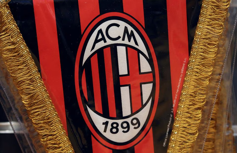 The AC Milan logo is pictured on a pennant in a soccer store in downtown Milan, Italy April 29, 2015. File Photo: REUTERS/Stefano Rellandini

